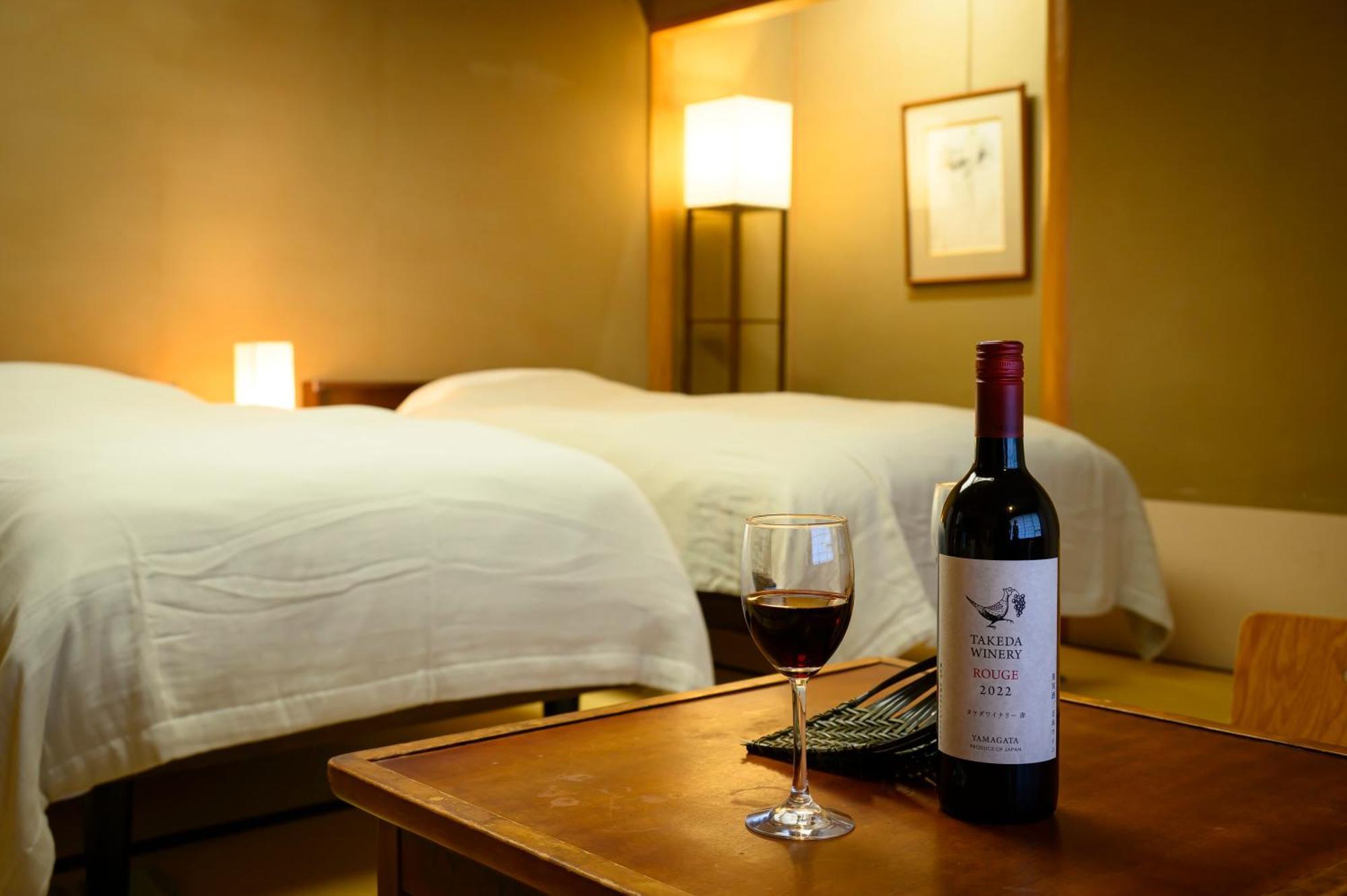 สึกิโอกะ โฮเต็ล Hotel Kaminoyama ภายนอก รูปภาพ